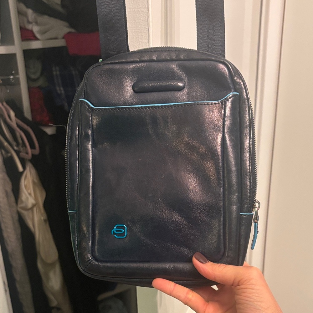 Sleek Black Messenger Bag with Blue Highlights
